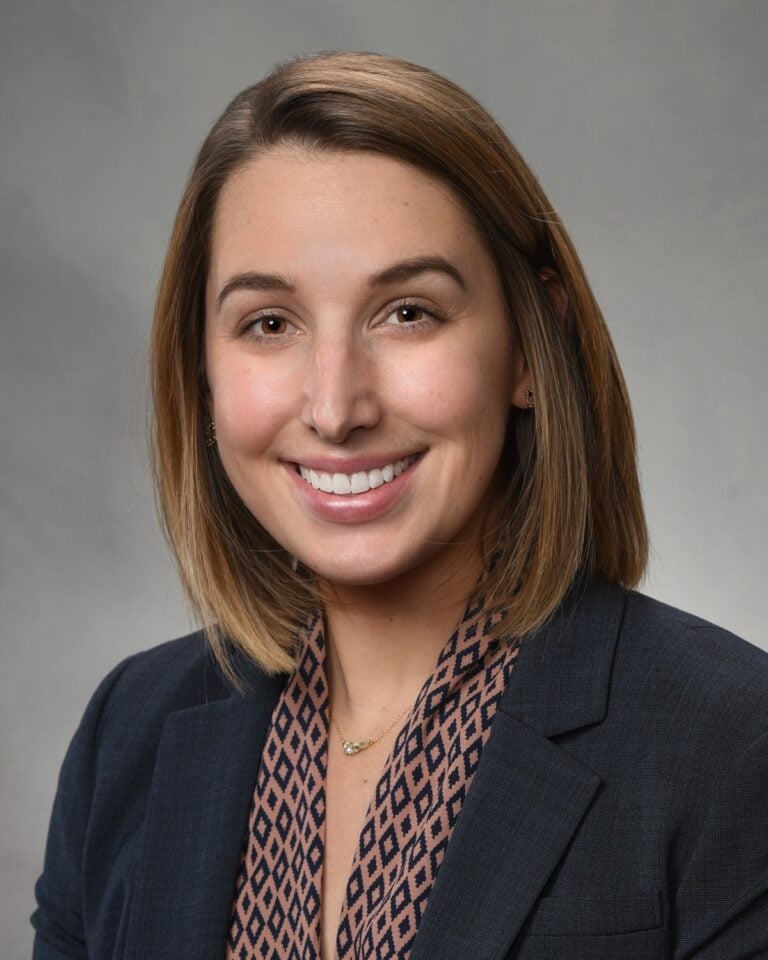 Woman smiling for professional headshot photo