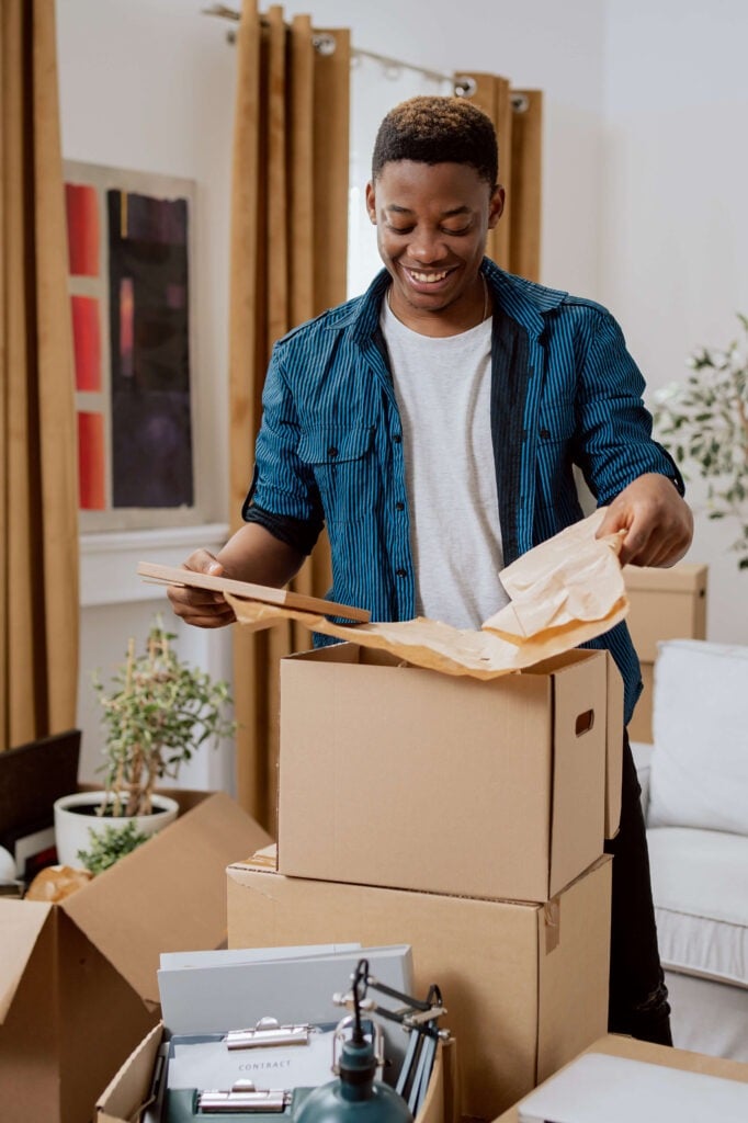 Man opening boxes